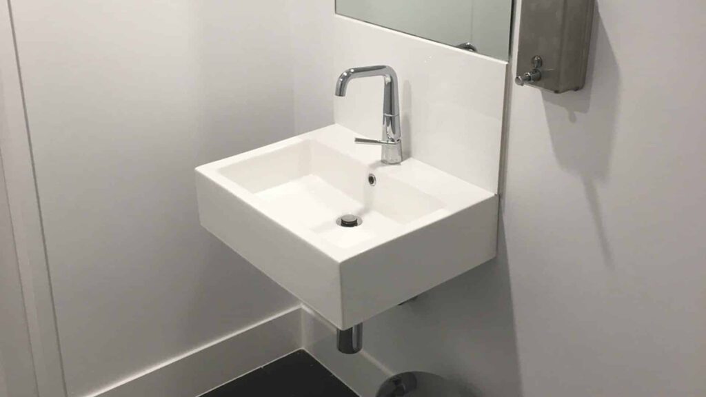 White bathroom sink | Featured Image for Tribella Group